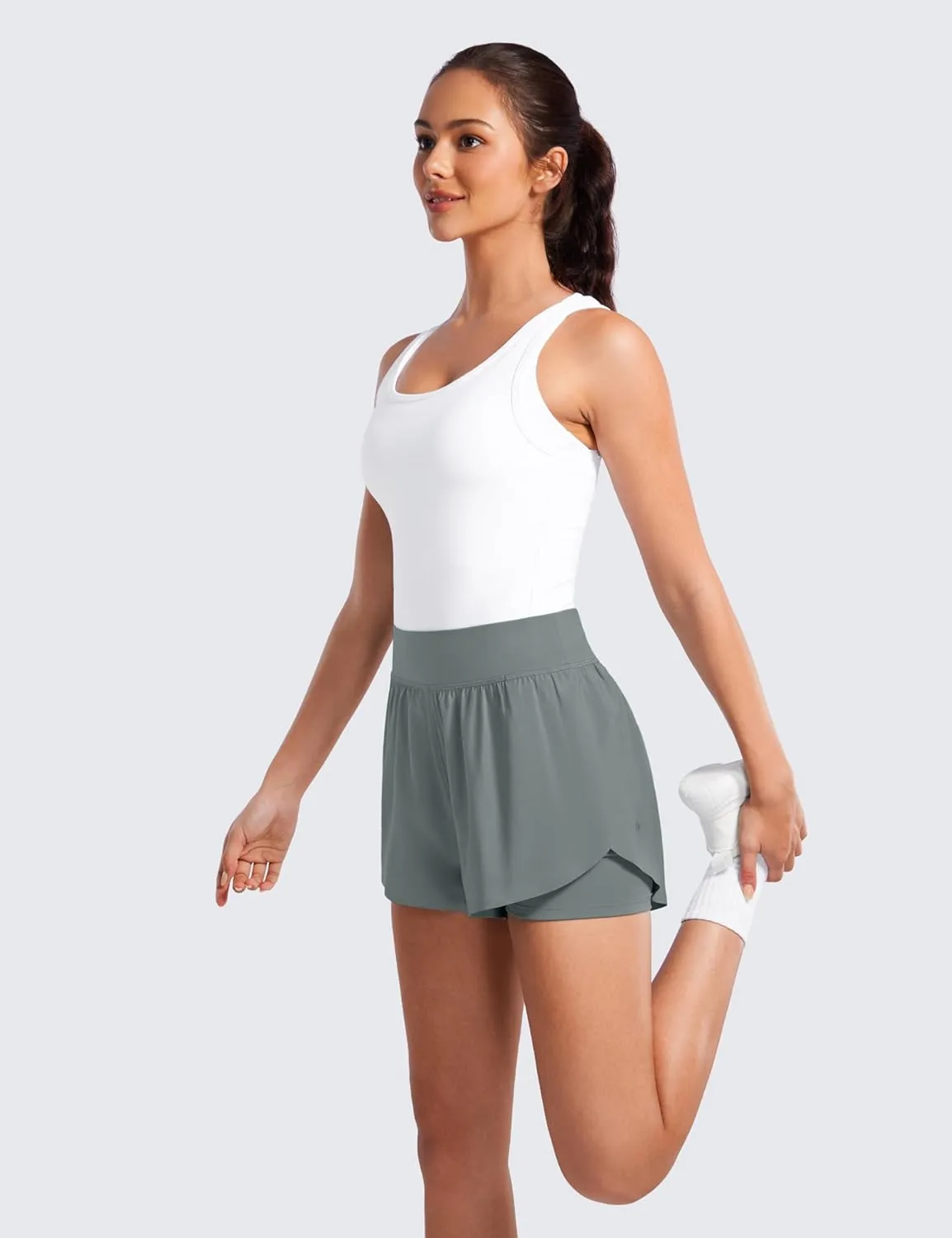 CRZ YOGA 2 in 1 Dolphin Running Shorts for Women High Waisted Gym Workout Athletic Tennis Shorts with Pockets Split