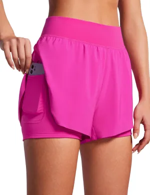 CRZ YOGA 2 in 1 Dolphin Running Shorts for Women High Waisted Gym Workout Athletic Tennis Shorts with Pockets Split