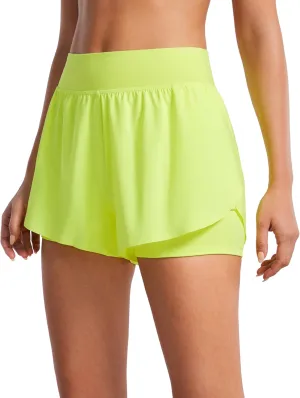 CRZ YOGA 2 in 1 Dolphin Running Shorts for Women High Waisted Gym Workout Athletic Tennis Shorts with Pockets Split