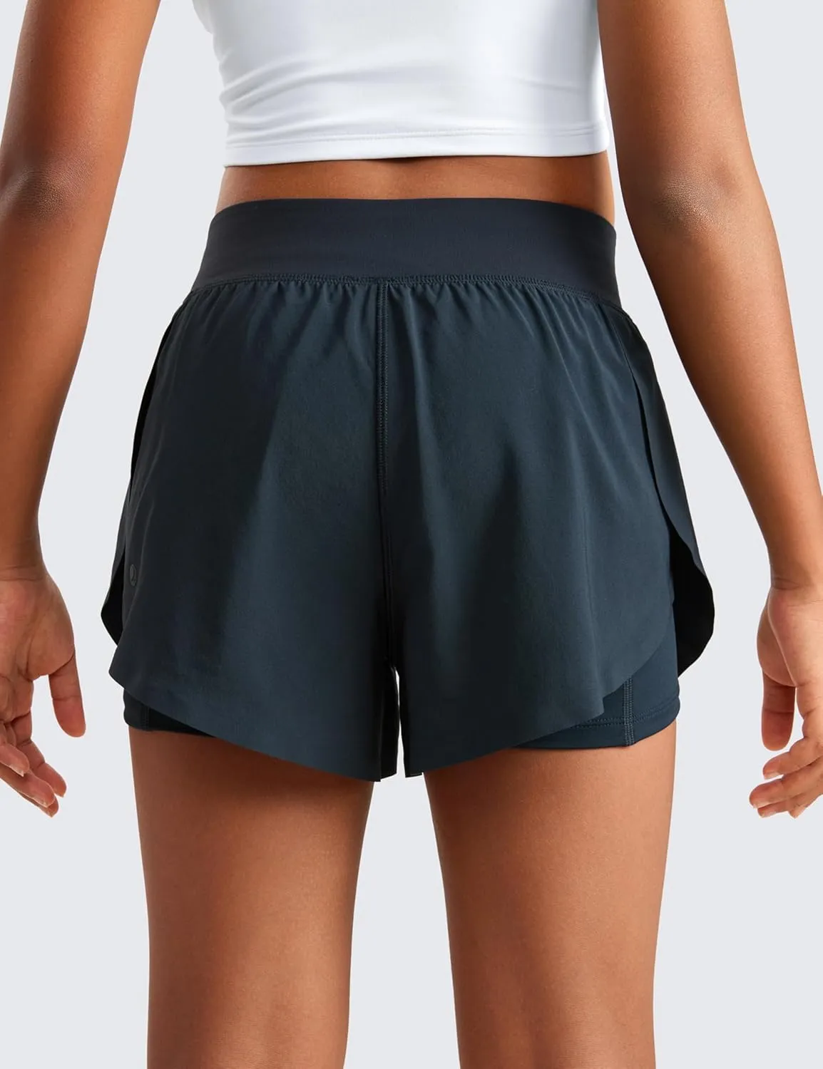 CRZ YOGA Girls 2 in 1 Dolphin Athletic Running Shorts with Pockets High Waist Teen Kid Workout Casual Tennis Soccer Split