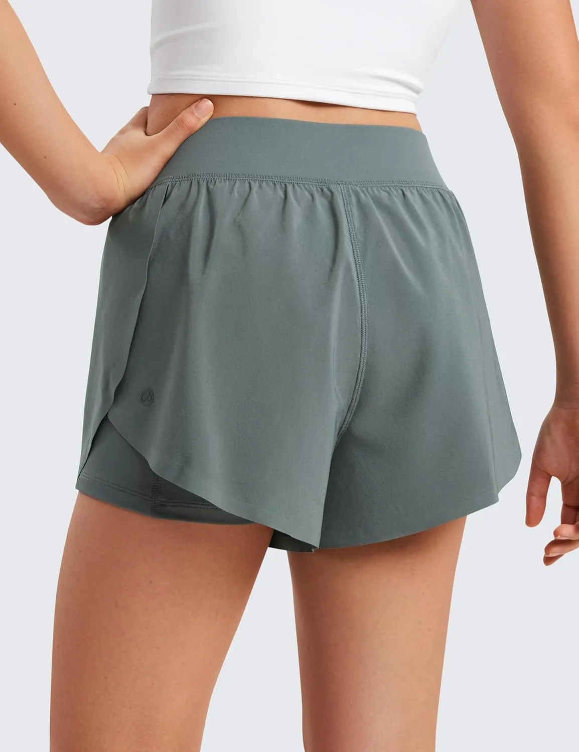 CRZ YOGA Girls 2 in 1 Dolphin Athletic Running Shorts with Pockets High Waist Teen Kid Workout Casual Tennis Soccer Split