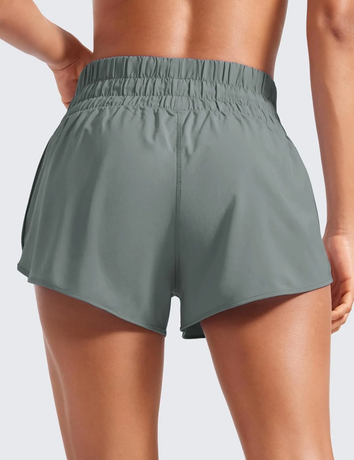 CRZ YOGA High Waisted Dolphin Running Shorts for Womens Mesh Liner for Gym Workout Athletic with Zipper Pocket